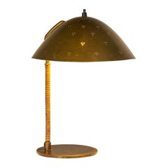Paavo Tynell for Taito Oy '9209' Table Lamp in Brass and Cane