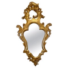 Miroir italien rococo baroque en bois doré