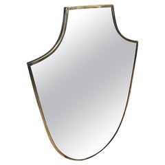 1950er Gio Ponti Stil Mitte des Jahrhunderts Moderne Messing Schild geformt Wandspiegel