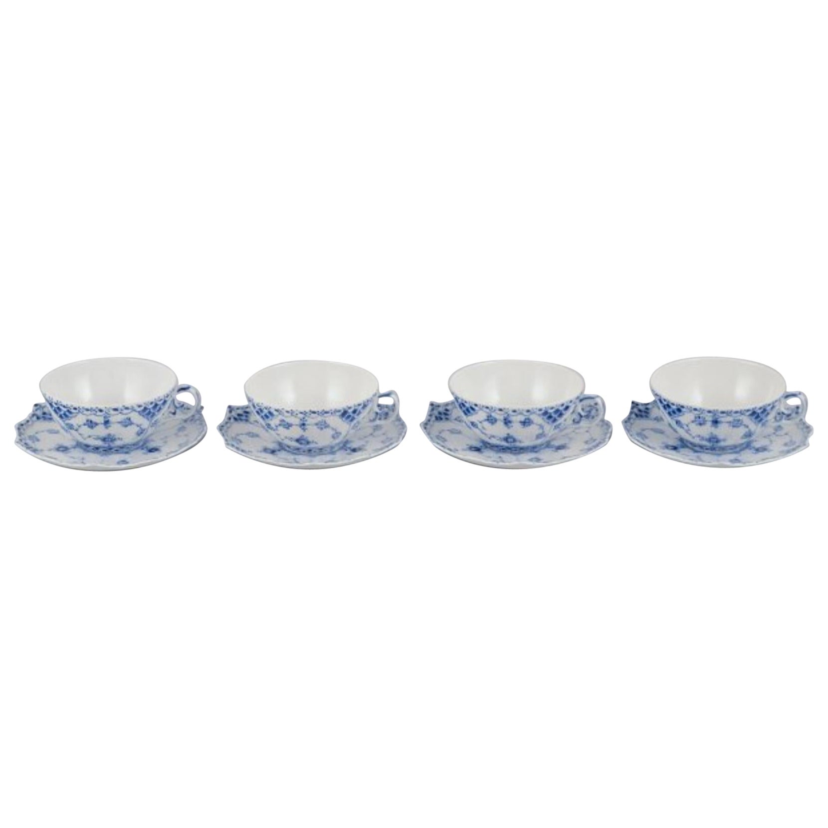 Royal Copenhagen Blue Fluted Full Lace, four large tea cups with saucers.