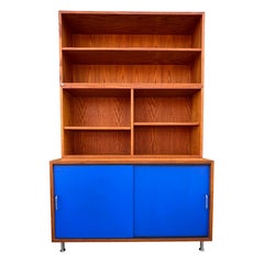 Oak Cabinet with Blue Sliding Doors and Movable Upper Cabinets