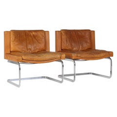 A Pair of Robert Haussmann for De Sede DS-201 Mid Century Tan Leather Chairs
