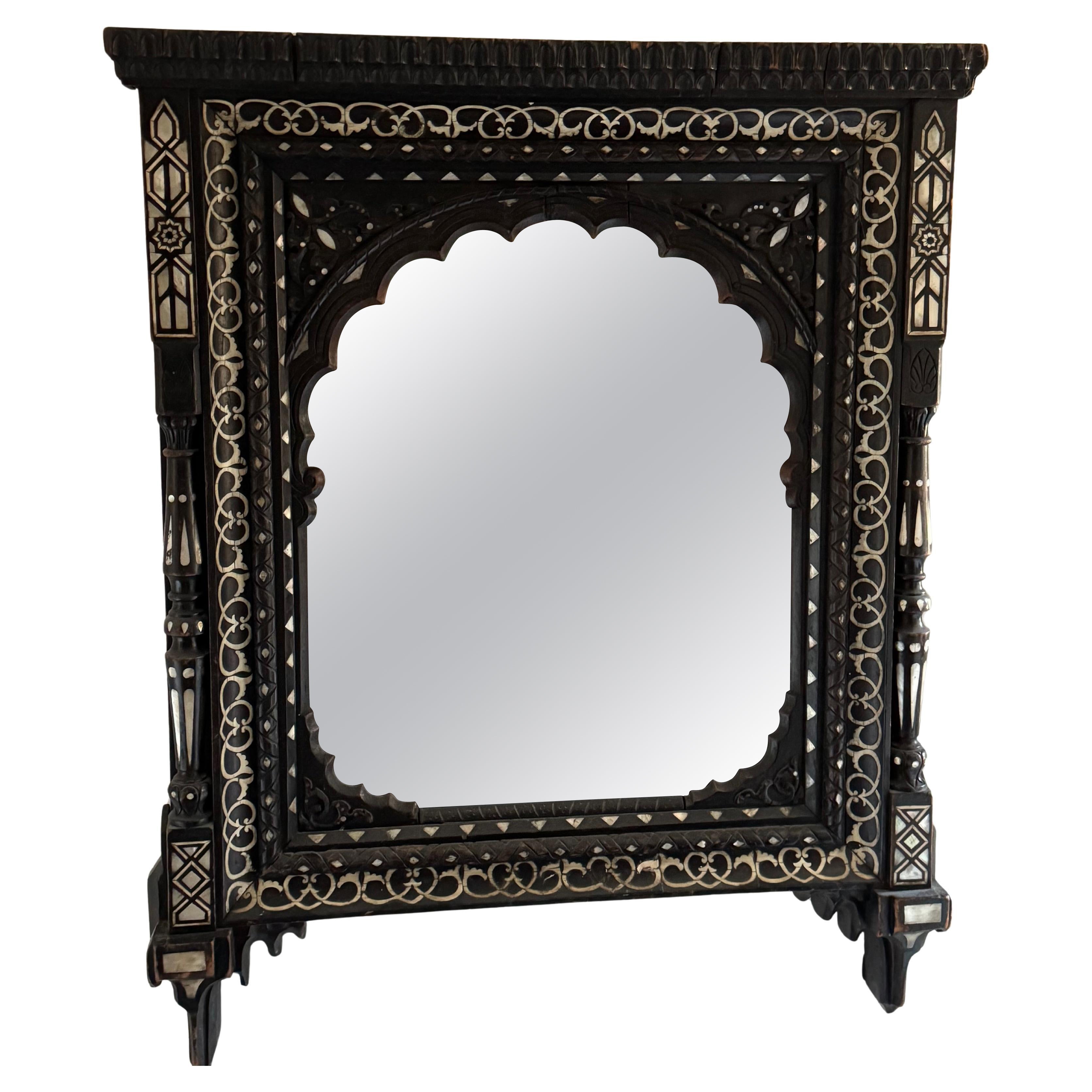 Indian Mirror, Ebonised wood, bone and mother-of-pearl, 19th c.