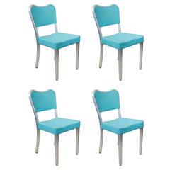 Four Goodform Aluminum Chairs