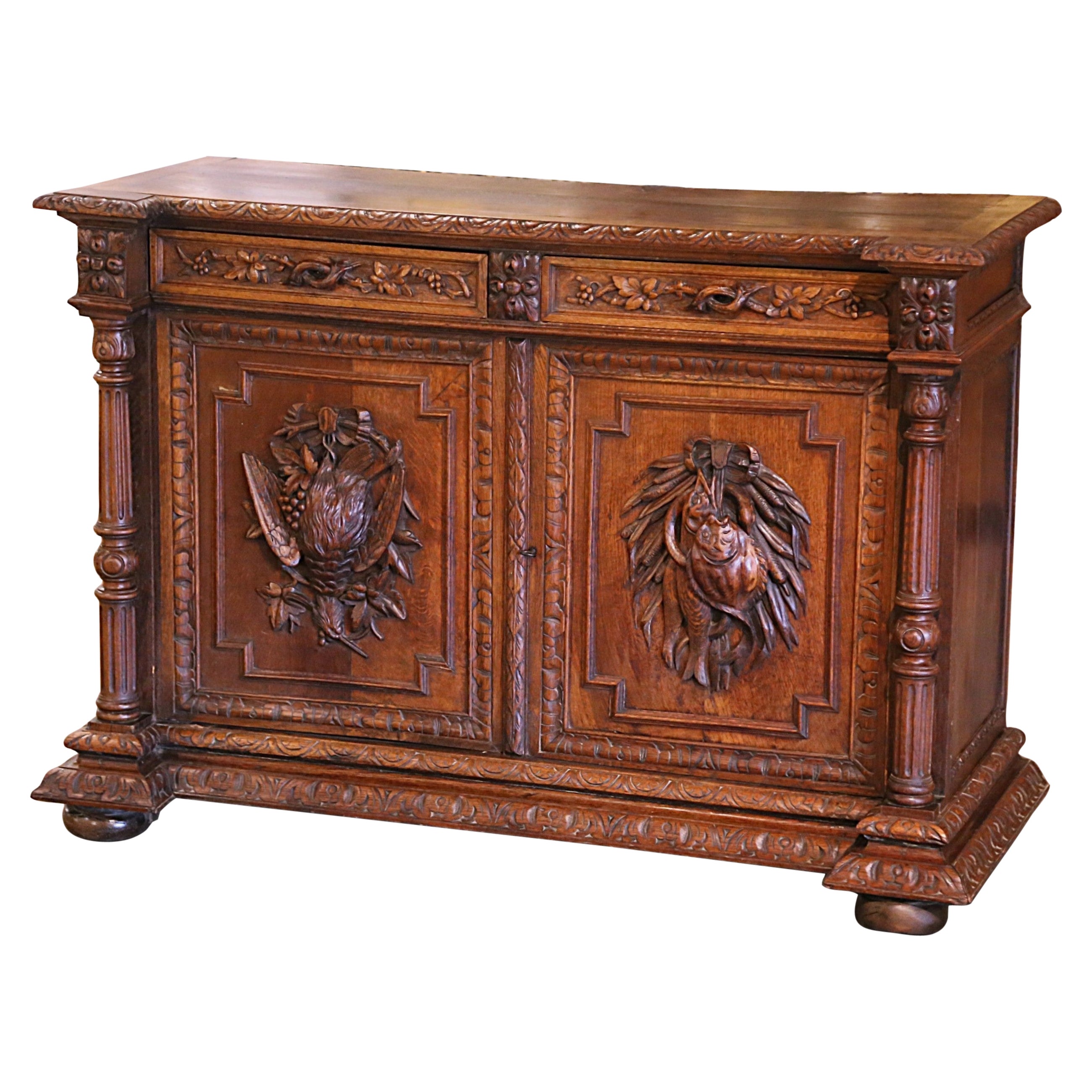 19th Century French Carved Oak Hunt Cabinet with Bird and Fish Motifs