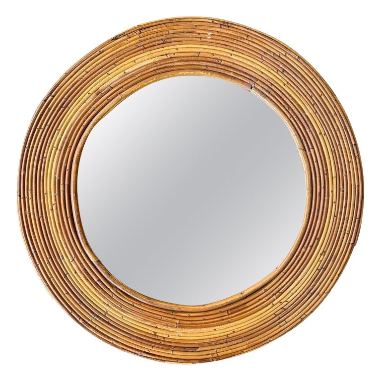 An Italian 1970s Vivai del Sud style circular pencil reed bamboo mirror