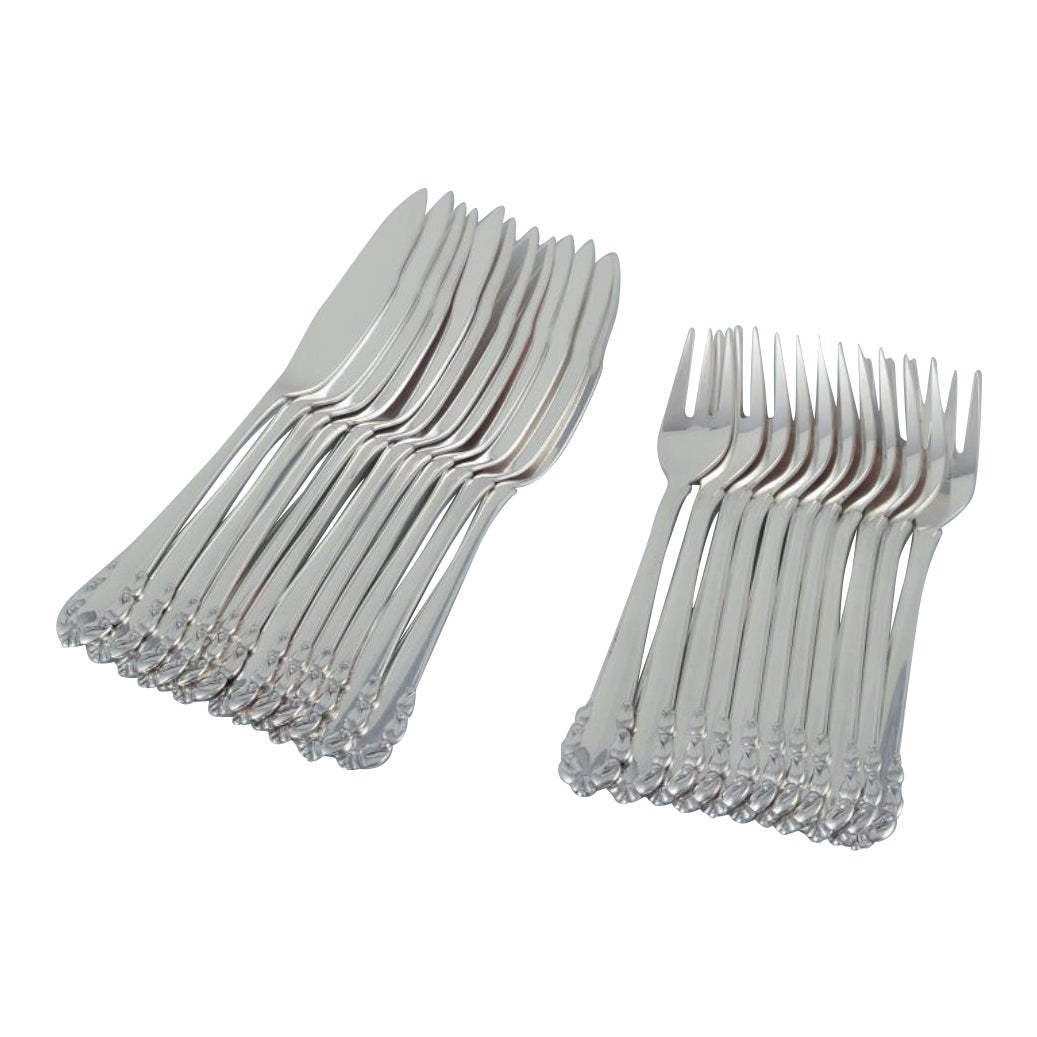Georg Jensen, komplettes Zwölf-Personen-Fischbesteck "Maiglöckchen". im Angebot