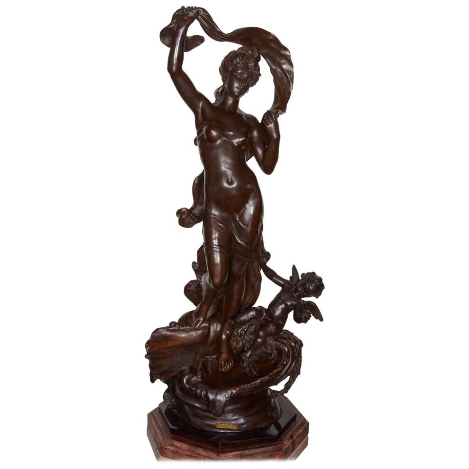 French late 19th century spelter sculpture by Hippolyte Moreau fitted with original 1 3/4" thick rouge griotte marble base. Hippolyte was one of the famous Moreau brothers, all of whom were sculptors. He was born in Dijon France in 1832 and died in