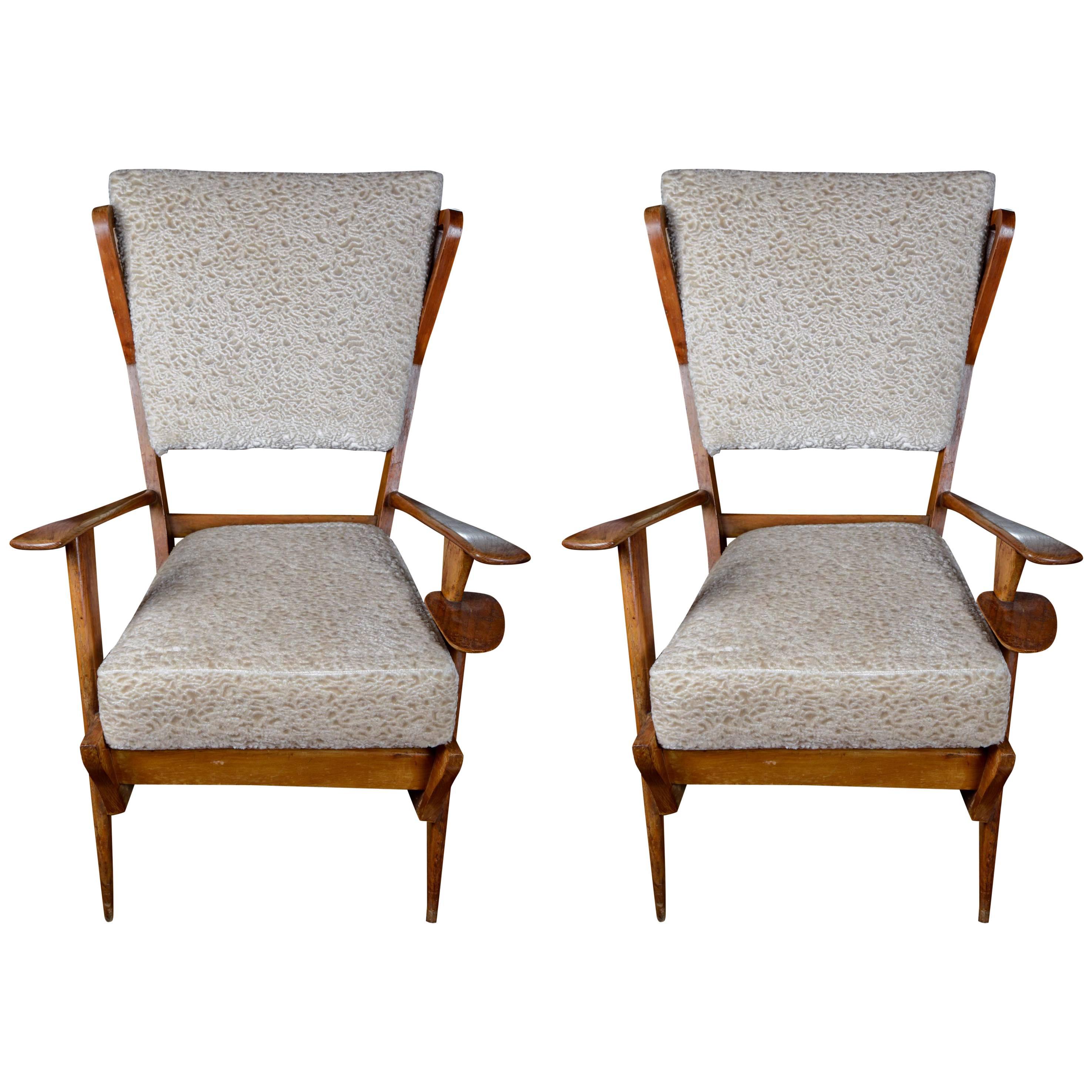 Pair of Italian vintage armchairs at cost price.