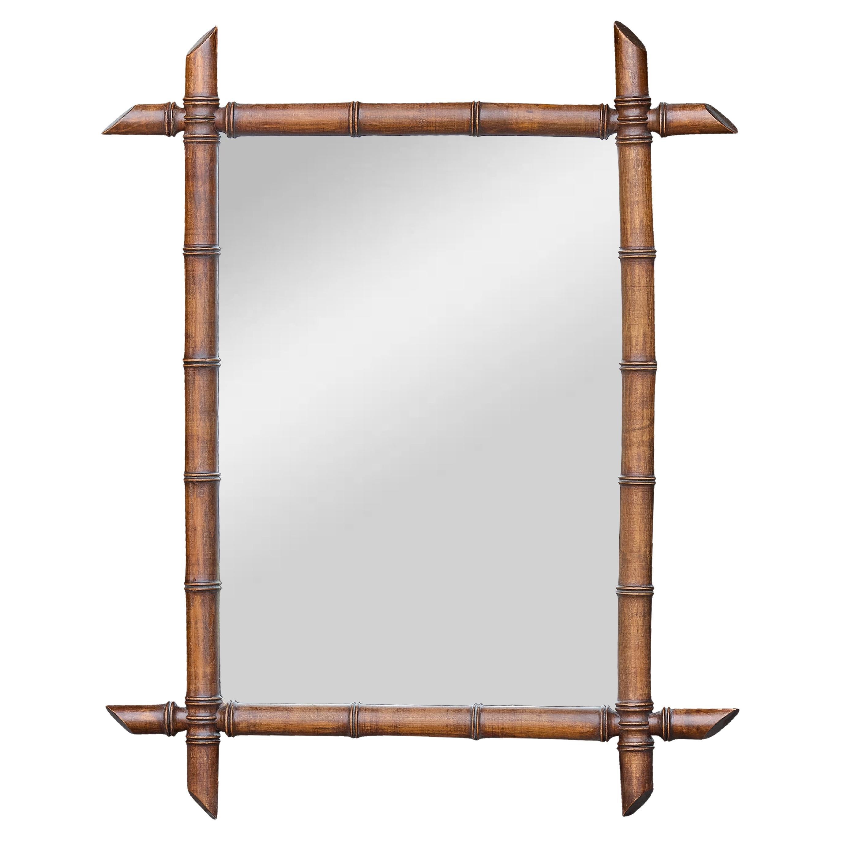 Grand miroir français en faux bambou et noyer avec épis de faîtage angulaires, vers 1900