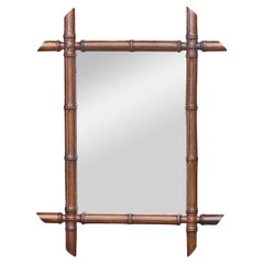 Miroir français en faux bambou et noyer avec cadre sculpté, vers 1900