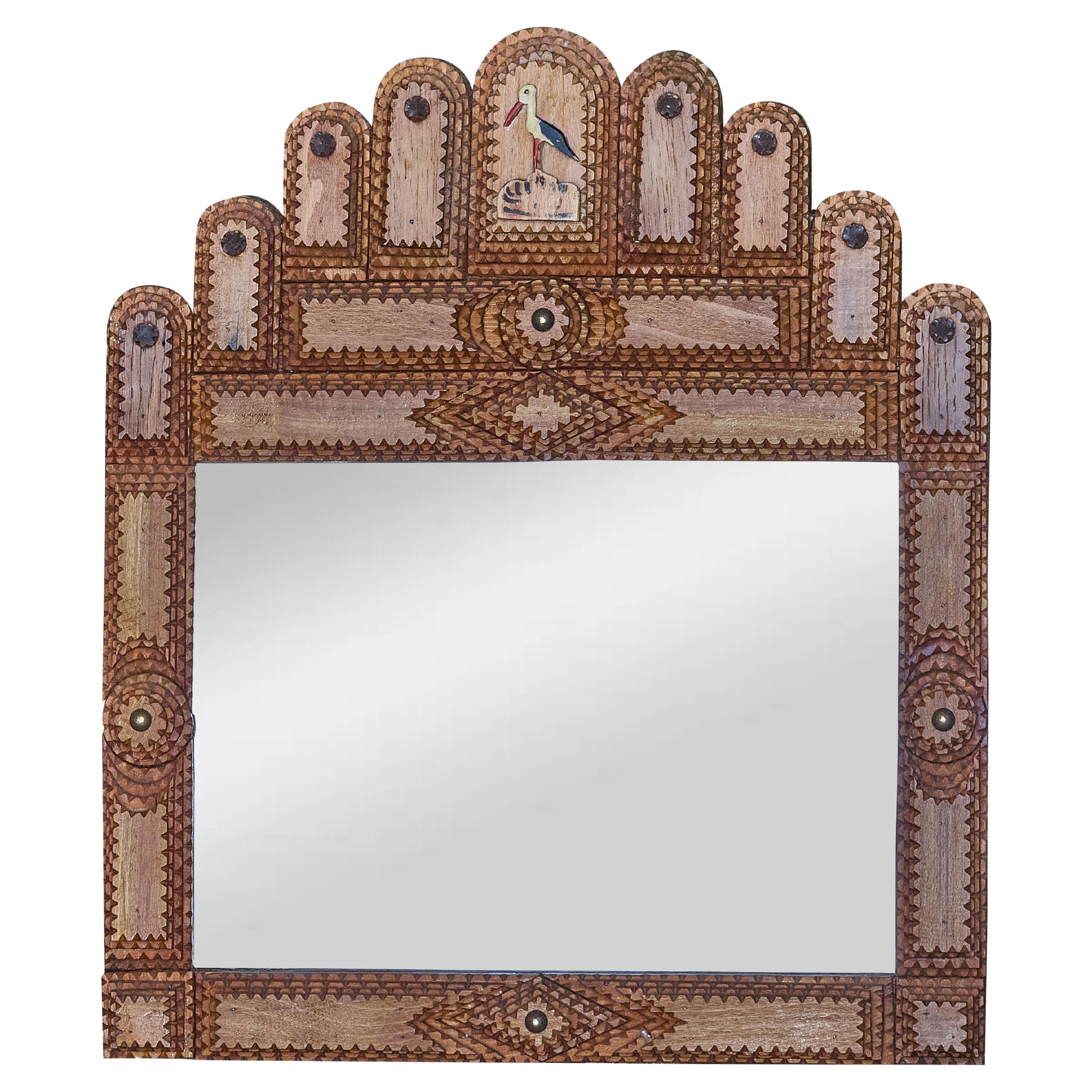 French Tramp Art Mirror with Arched Top and Painted Stork Crest, circa 1900