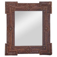Petite French Tramp Art Mirror with Carved Geometric Frame, circa 1900