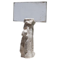Scultura di specchio e argilla