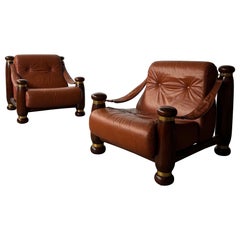 Mid-century leather and wood armchairs , Italy 1970s
