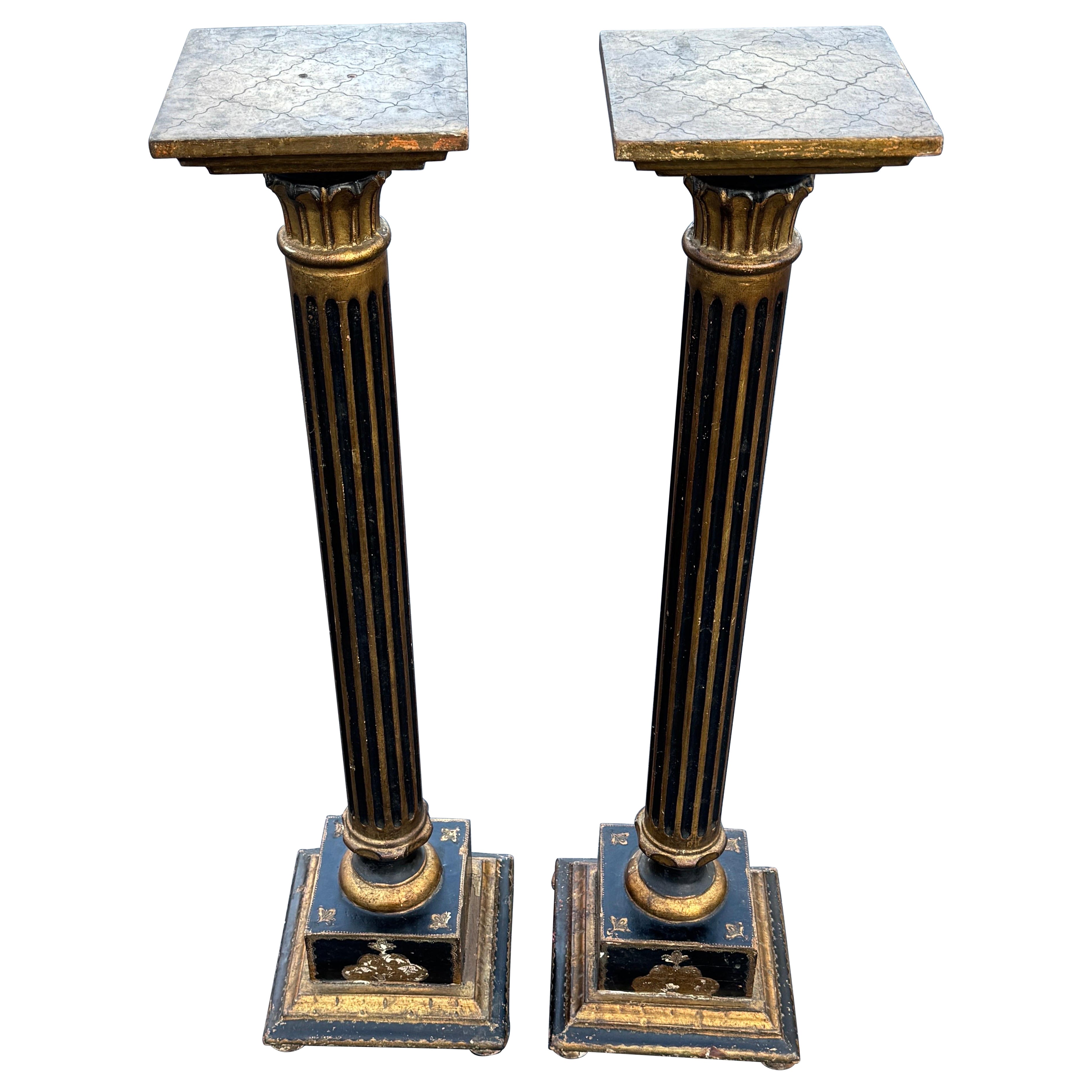 Pair Italian Florentine Black and Gold Gilt Pedestal Plant Stands For Sale