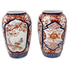 Pair of Antique 100-Year-Old Japanese Hand-Painted Imari Porcelain Vases.