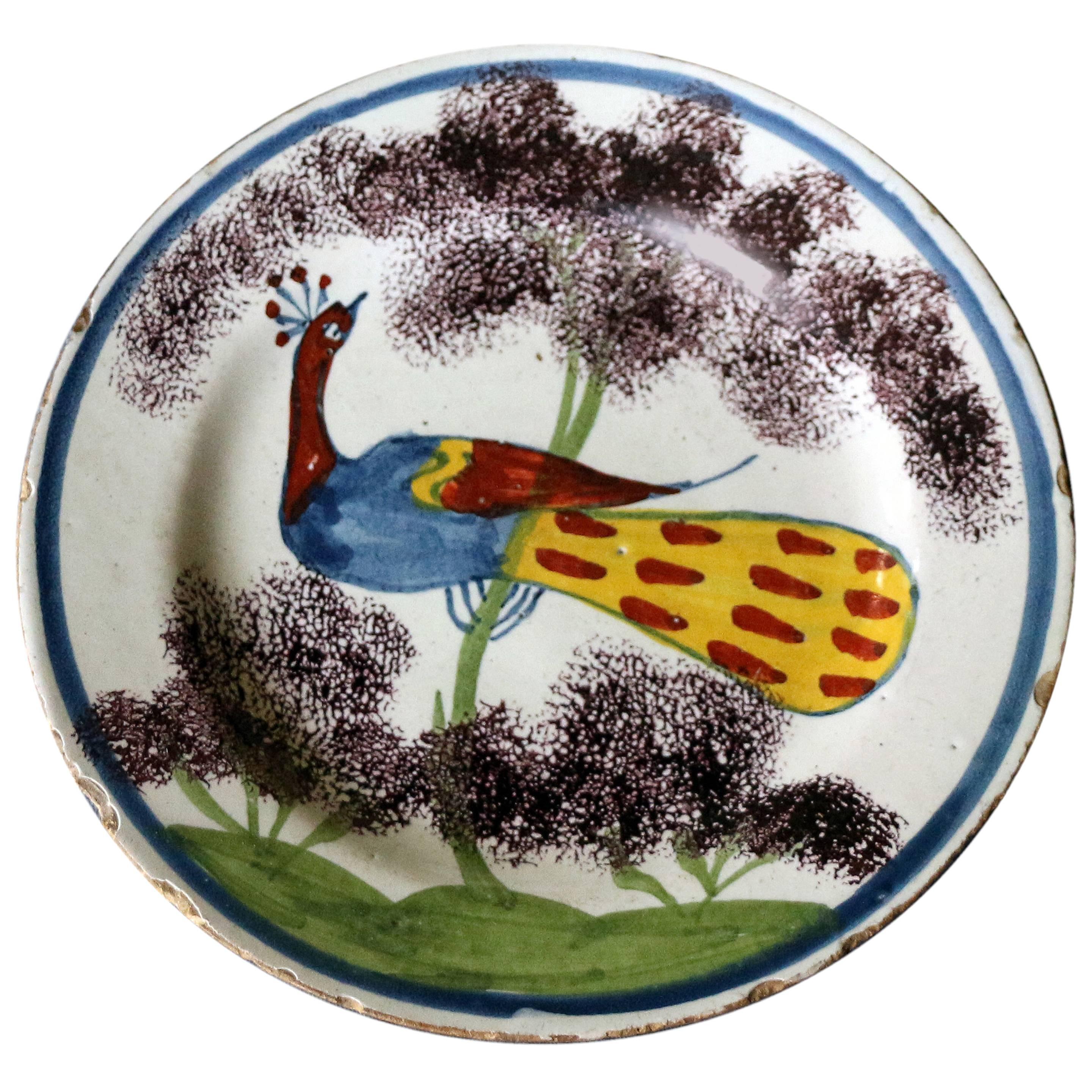English Delftware Polychrome Decorated Peacock Farmhouse Plate For Sale