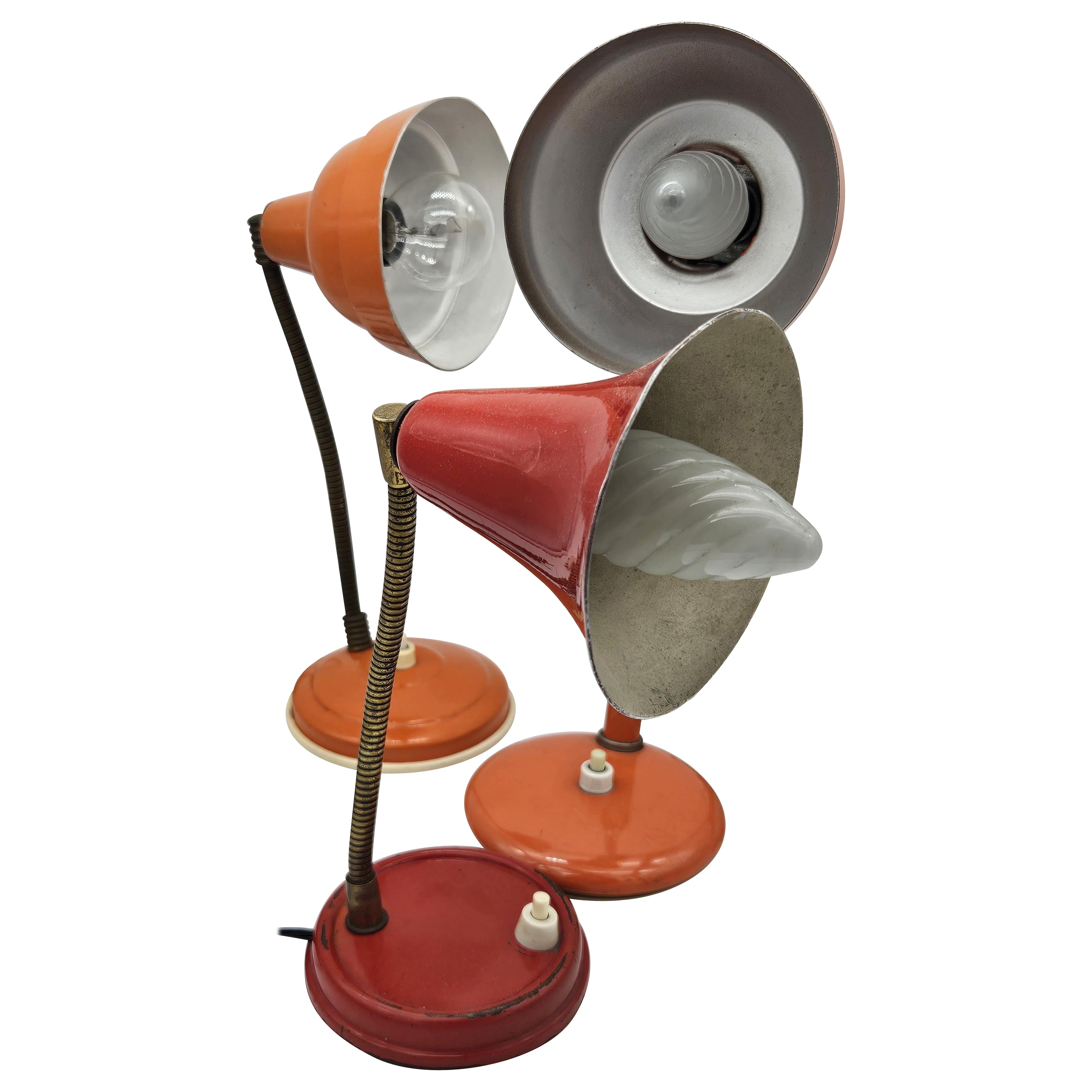 Three vintage 1970s metal colored table lamps