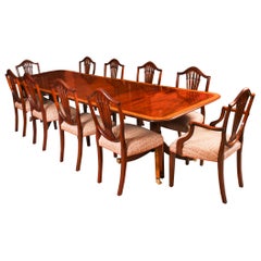 Tavolo da pranzo vintage a due colonne in mogano e 10 sedie XX secolo
