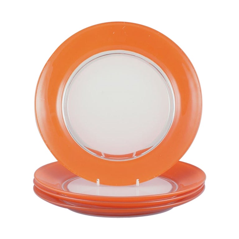 Duralex, France. Set of four art glass plates in orange and white glass. 1970s For Sale
