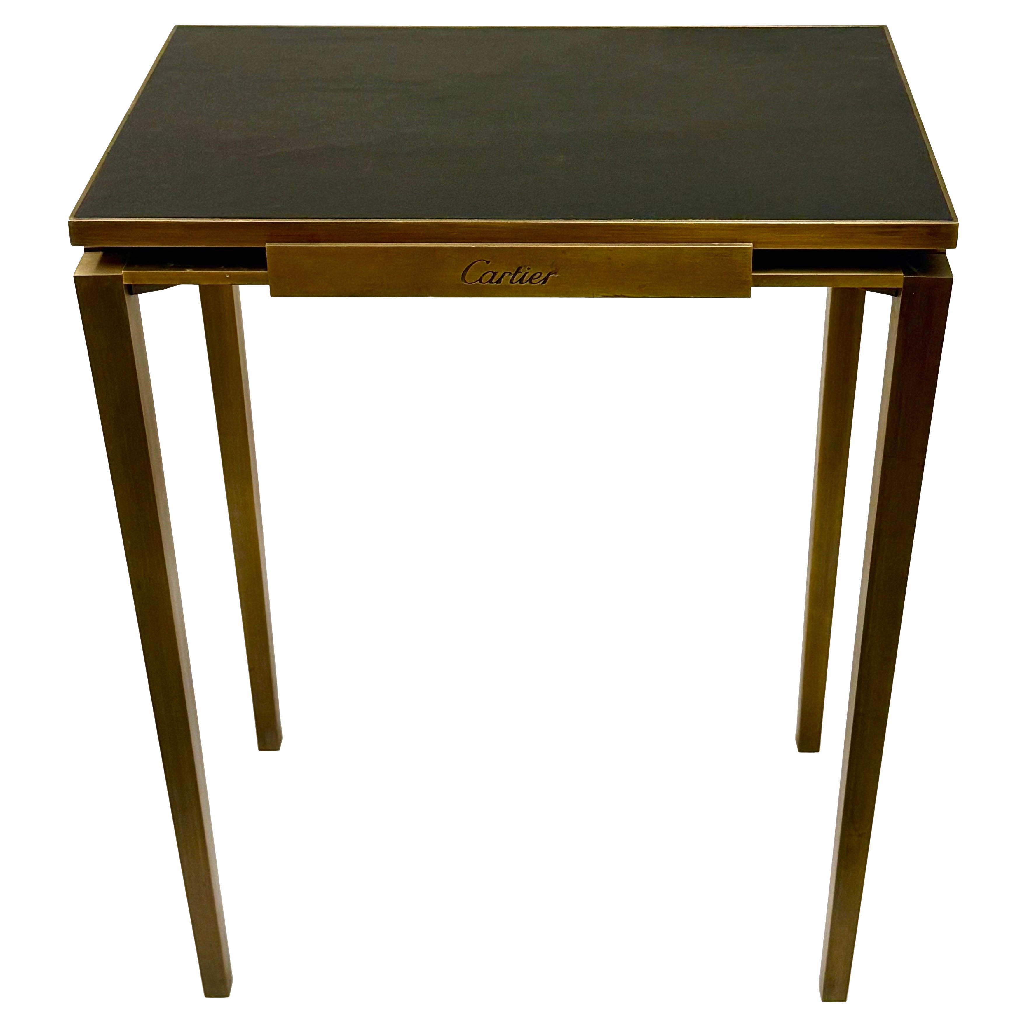 Bronzo Rara console francese di metà secolo in bronzo massiccio e pelle, firmata Cartier, Parigi in vendita