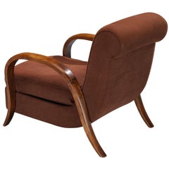 French Art Deco Lounge Chair with Elegant Arched Armrests