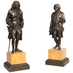 Pair of Bronze Sculptures of Voltaire and Rousseau