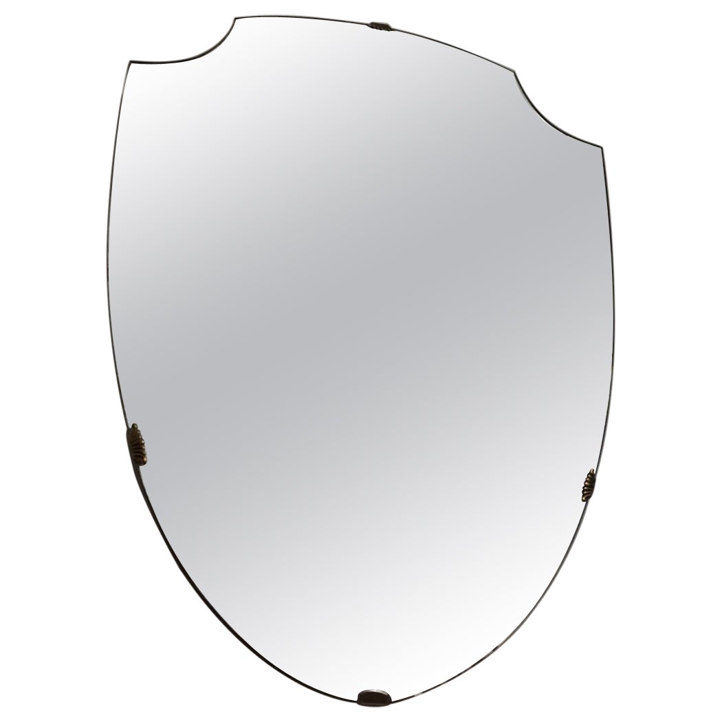 Gio Ponti-style brass wall-mounted Scudo mirror, 1950s