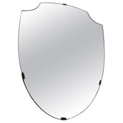 Gio Ponti-style brass wall-mounted Scudo mirror, 1950s