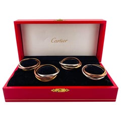 Vintage CARTIER napkin rings with box 4 pieces, "Trinity