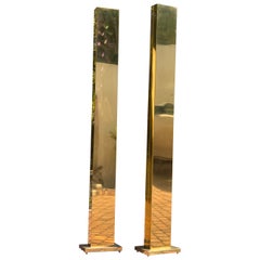 A pair of monolith brass “Pylon” torchiere floor lamps by Casella, circa 1980