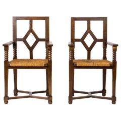 Dudouyt Inspired Regionalist Armchairs in Stained Oak & Rush - France 1940's
