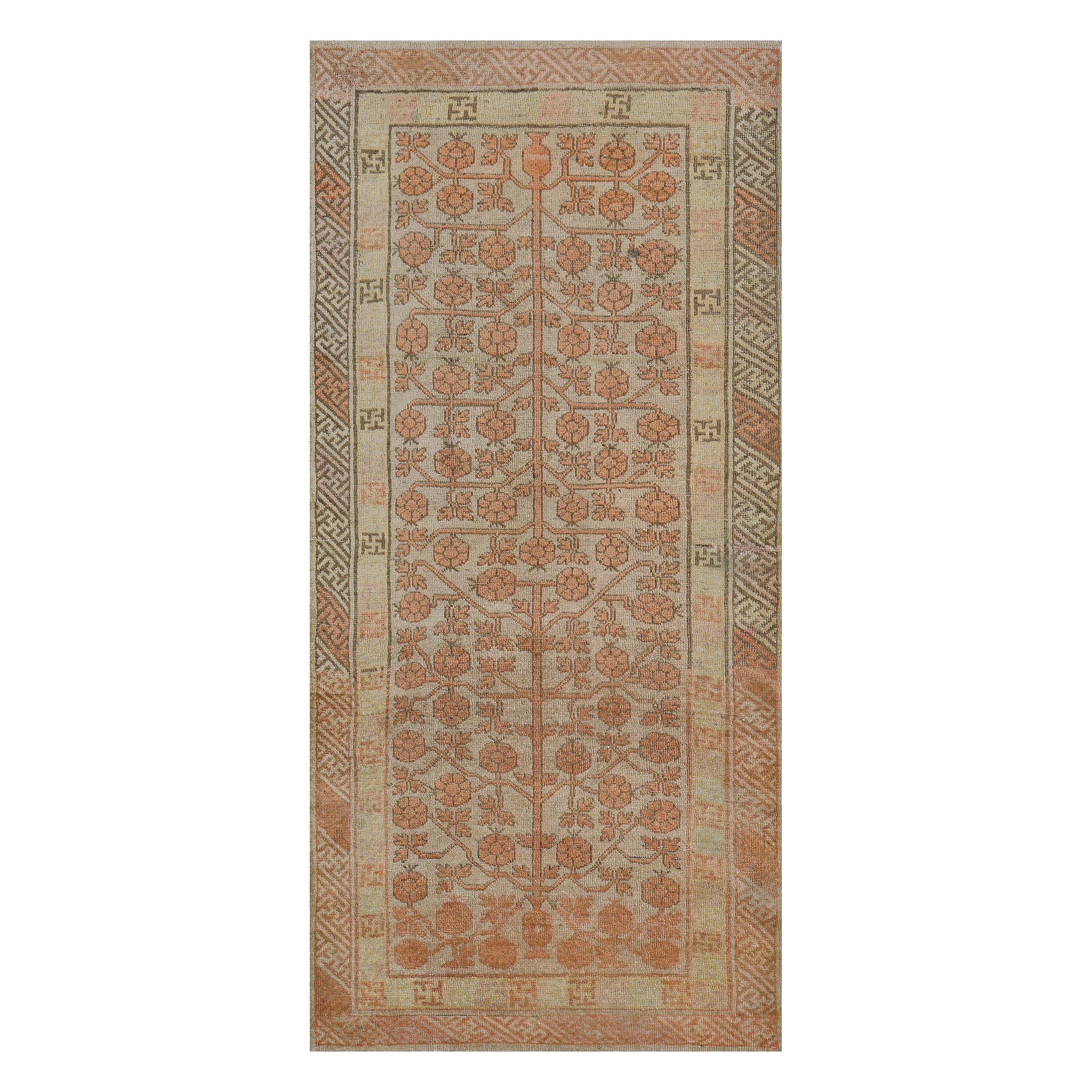 Handwoven Antique Buff-Brown Pomegranate Khotan Rug For Sale