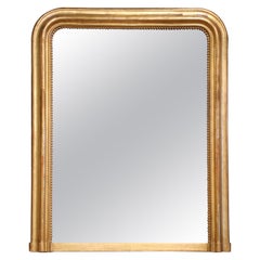 19th Century French Louis Philippe Carved Giltwood Mantel Mirror with Bead Decor