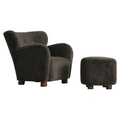 A Lounge Chair / Armchair and Ottoman, Upholstered in Pure Alpaca