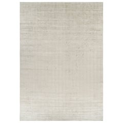 Rug & Kilim’s Oversized Contemporary Textural Solid Rug in Light Beige Tones