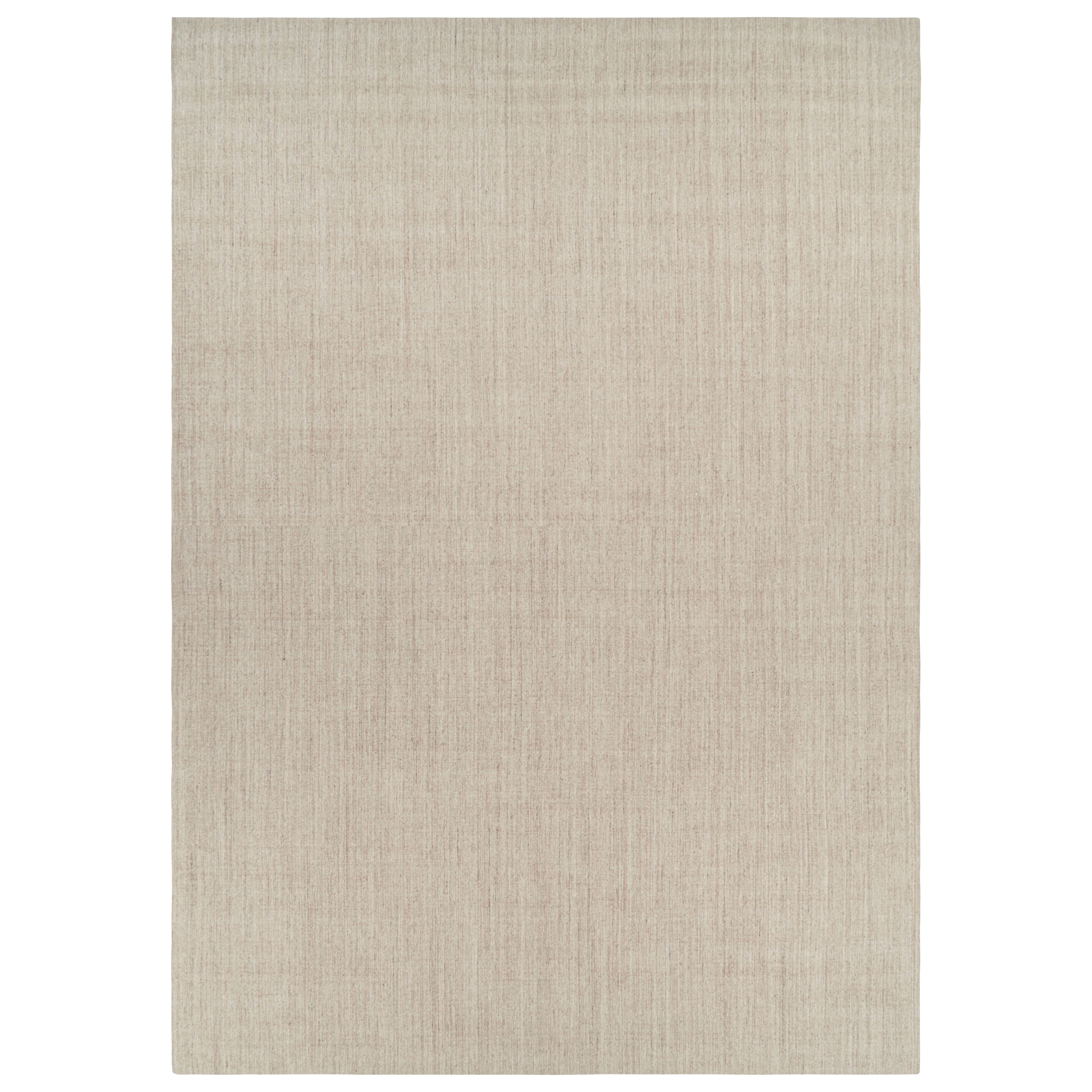 Rug & Kilim’s Oversized Modern Textural Solid Rug in Beige Tones and Striae