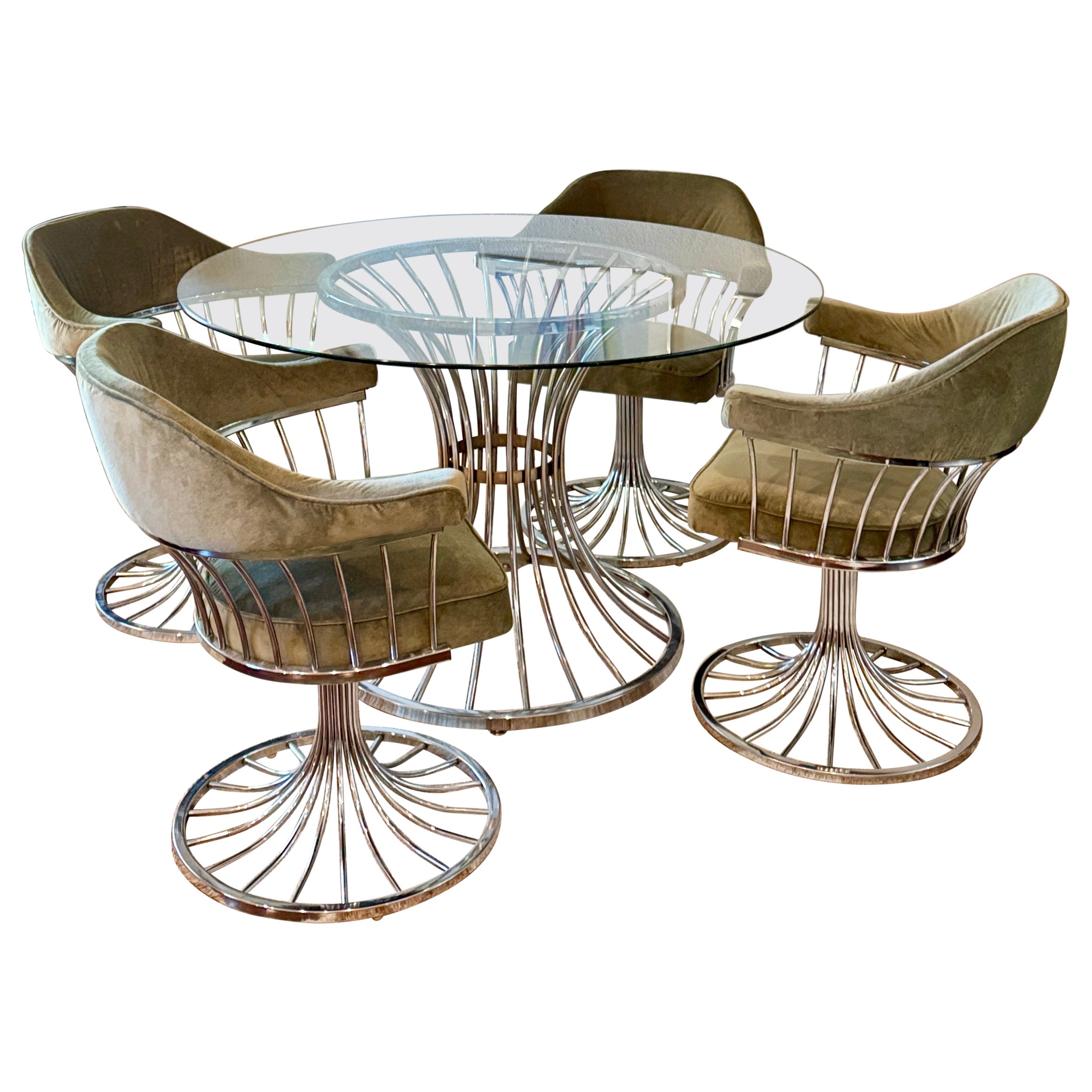 A mid century modern tulip chrome dining set circa 1970s