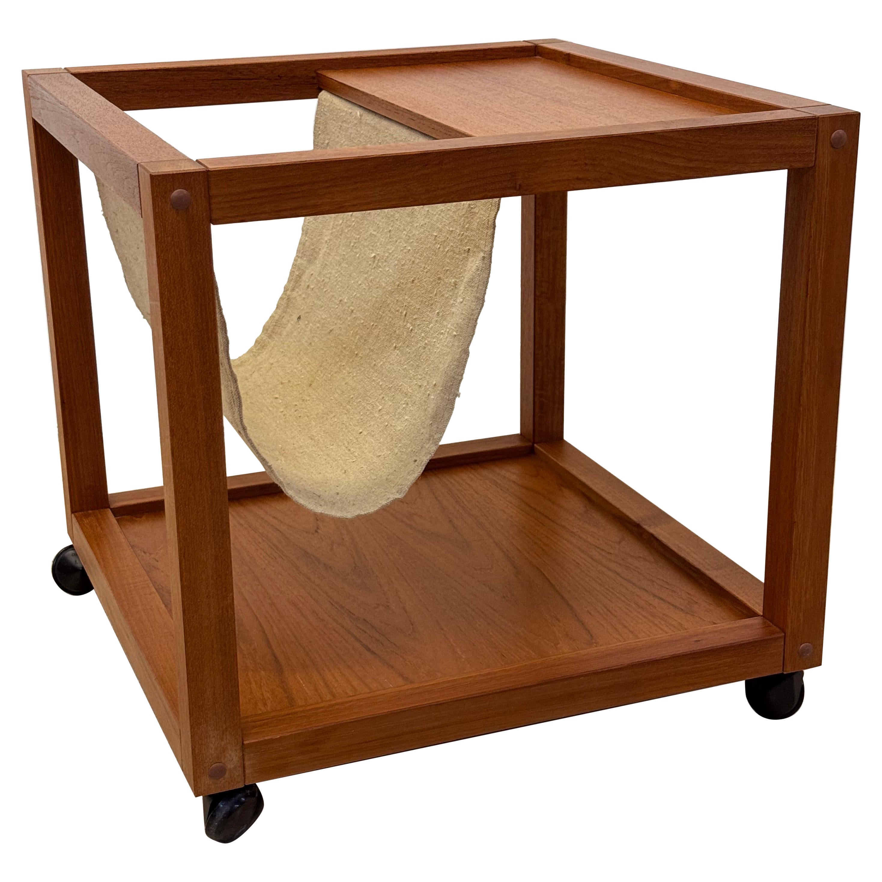 Mid-Century Danish Modern Teak Wood Rolling End Table With Magazine or Book Hold For Sale