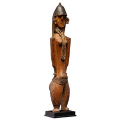 Rare wooden Ceremonial Karaja doll with distinctive circles on the face, Brazil