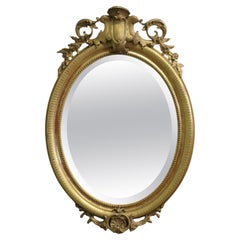 A Very Large French Rococo Oval Gilt Wall Mirror