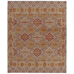 Rug & Kilim's Distressed Style Teppich in Lila mit roten und goldenen Medaillonmustern