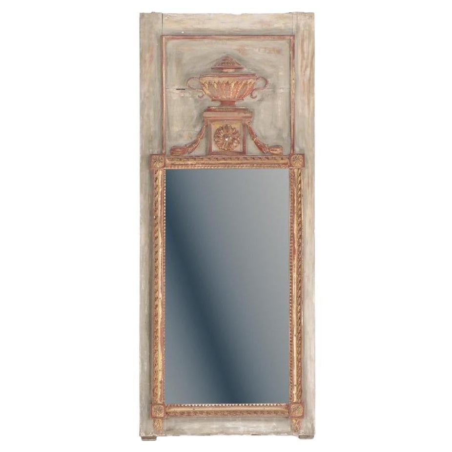 A French painted and carved Trumeau mirror, early to mid 19th C.