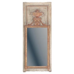 A French painted and carved Trumeau mirror, early to mid 19th C.