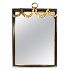 W. & J. Sloane Hollywood Regency Ebonized and Parcel Gilt Swag Wall Mirror