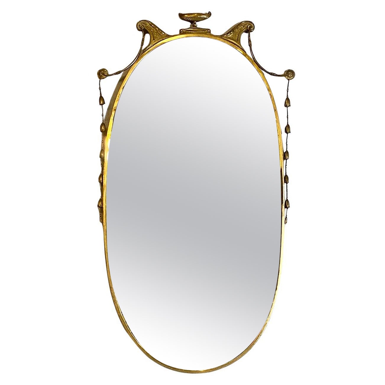 Italian mid-century modern oval brass wall mirror with classic friezes, 1950s