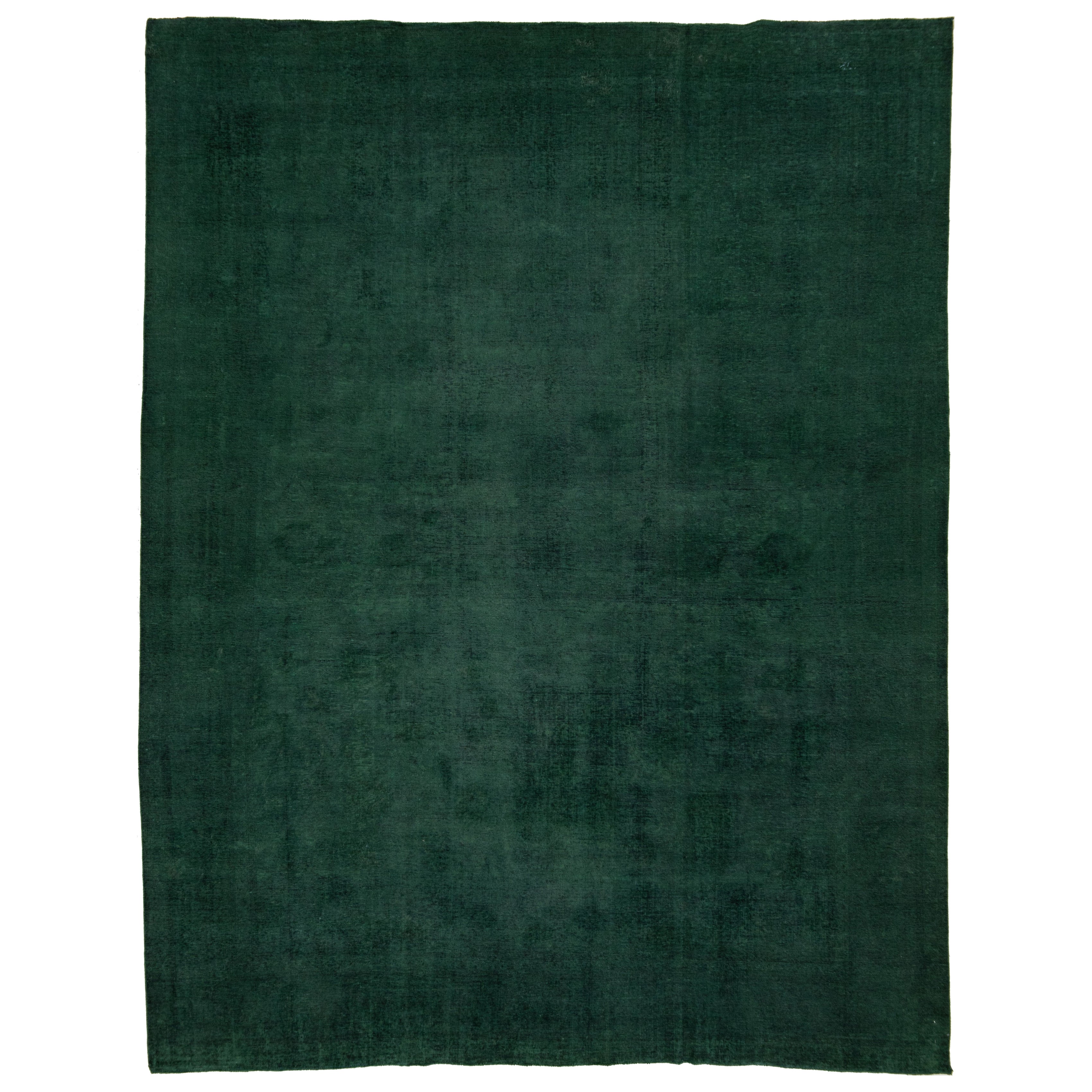 Vintage Overdyed Persian Wool Rug In Green with Allover Floral Design