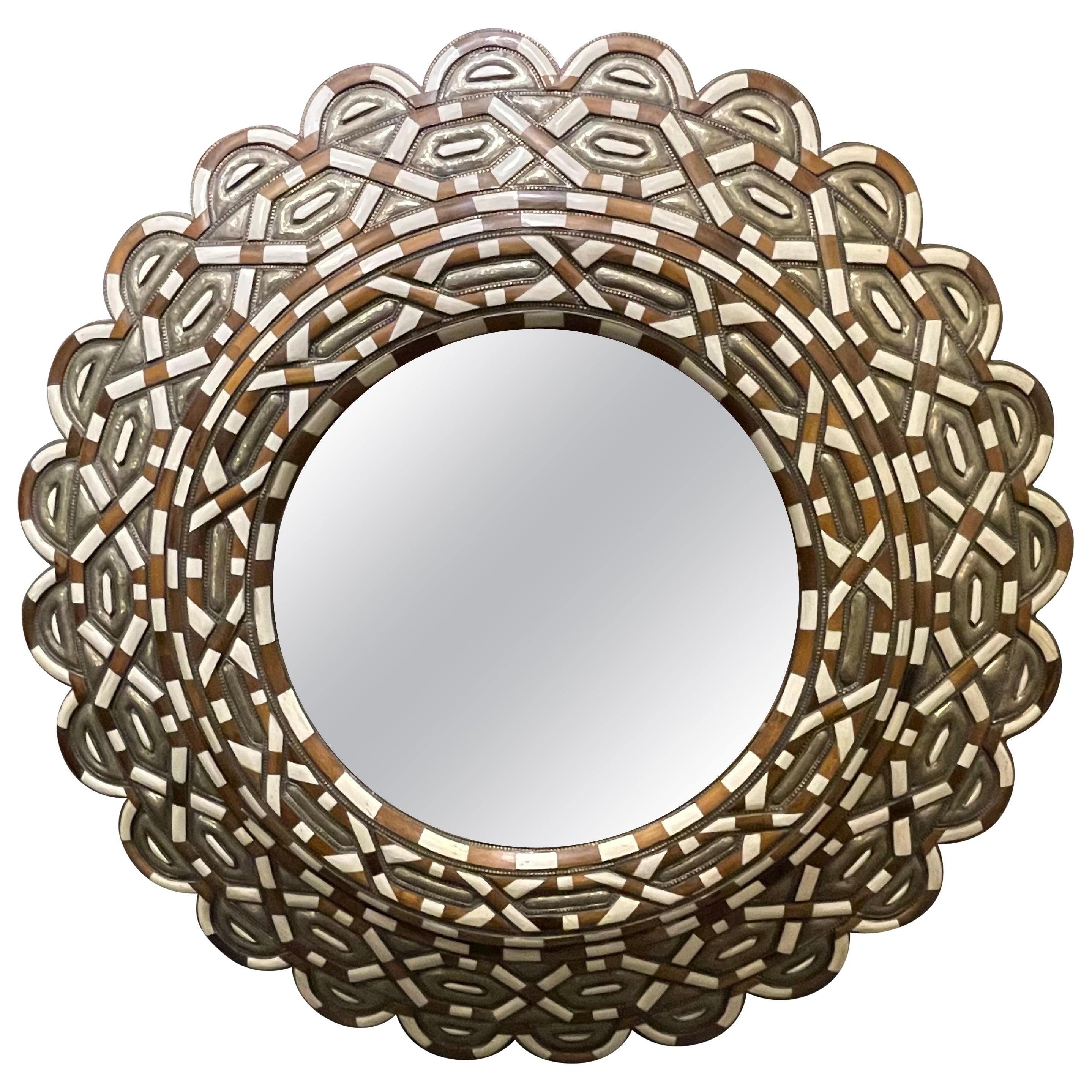 A Large Round Moroccan Style Mirror