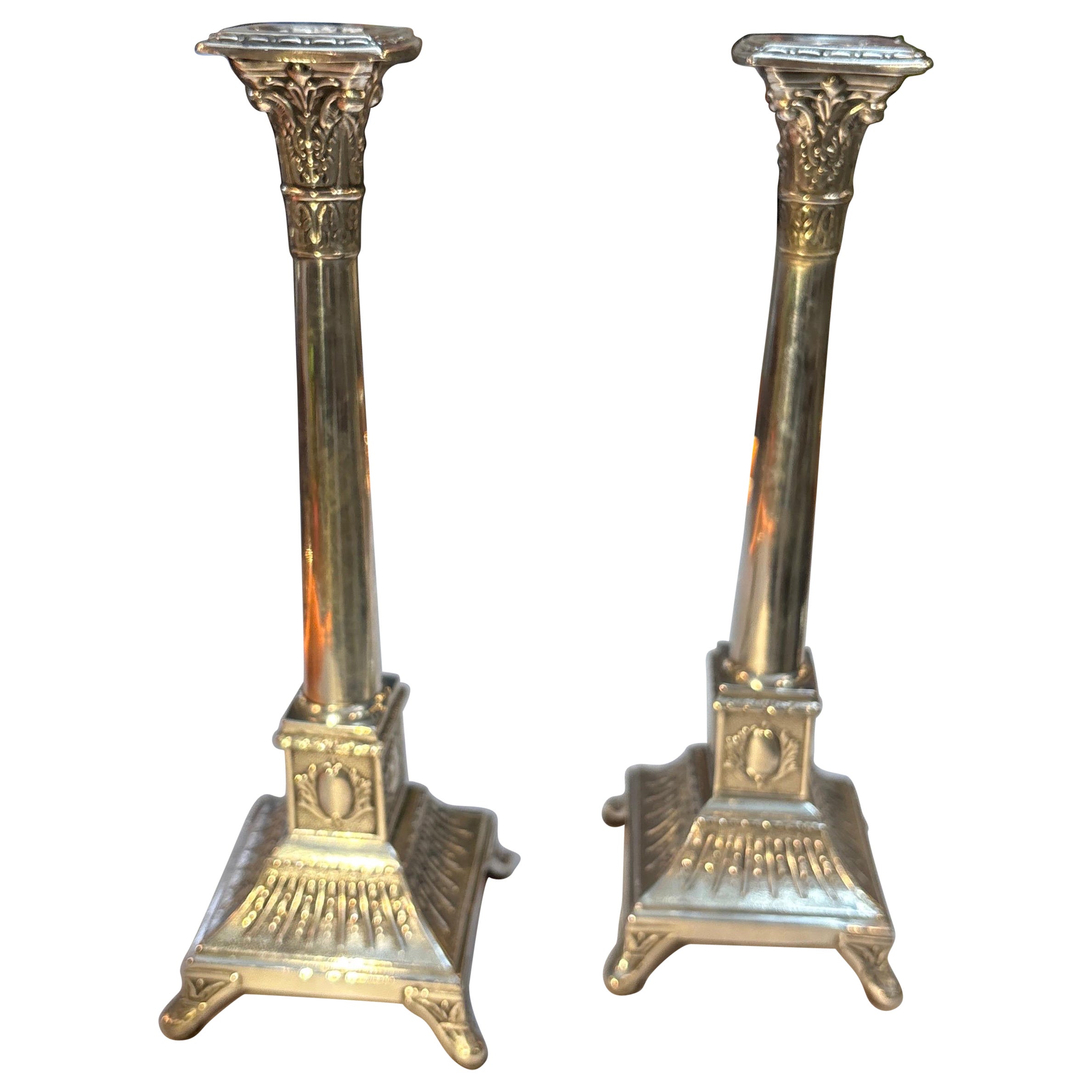 A Pair of 19th Century European Column Style Sterling Silver Candlesticks